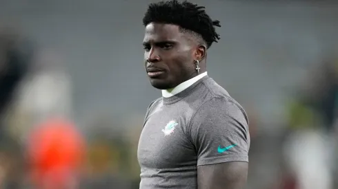 Tyreek Hill #10 of the Miami Dolphins warms up prior to a game Green Bay Packers at Lambeau Field on November 28, 2024 in Green Bay, Wisconsin.