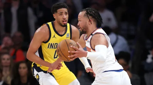 Jalen Brunson #11 of the New York Knicks is defended by Tyrese Haliburton #0 of the Indiana Pacers