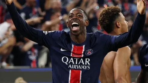 Ousmane Dembele of Paris Saint-Germain celebrates after Desire Doue of Paris Saint-Germain scores his team's third goal during the UEFA Champions League Final 2025.