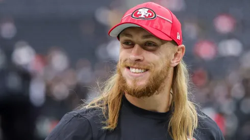 Tight end George Kittle #85 of the San Francisco 49ers smiles before a preseason game against the Las Vegas Raiders at Allegiant Stadium on August 13, 2023 in Las Vegas, Nevada. The Raiders defeated the 49ers 34-7.