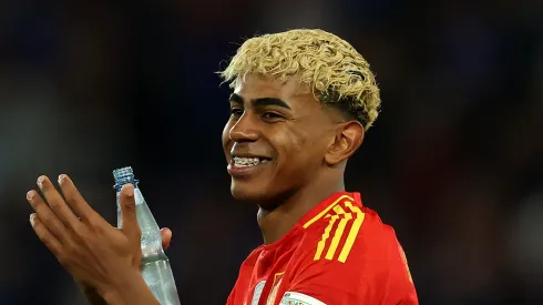 Lamine Yamal of Spain applauds the fans following victory in the UEFA Nations League 2025 semifinal match between Spain and France at Stuttgart Arena.