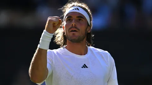 Stefanos Tsitsipas of Greece celebrates set point against Andy Murray of Great Britain in the Men's Singles second round match during day five of The Championships Wimbledon 2023.