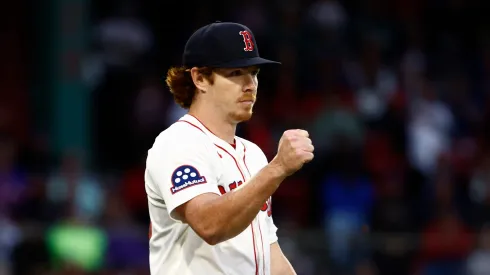 Pitcher Hunter Dobbins #73 of the Boston Red Sox reacts after a double play against the New York Mets ended the third inning at Fenway Park on May 19, 2025 in Boston, Massachusetts.