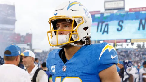 Justin Herbert #10 of the Los Angeles Chargers looks on after his team's 27-24 overtime loss against the Tennessee Titans at Nissan Stadium on September 17, 2023 in Nashville, Tennessee.