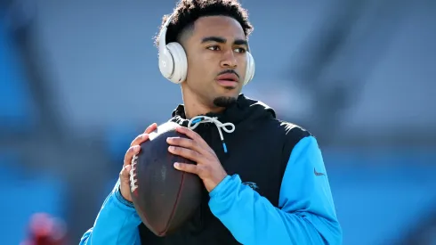 Bryce Young #9 of the Carolina Panthers warms up prior to the game against the Arizona Cardinals at Bank of America Stadium on December 22, 2024 in Charlotte, North Carolina.