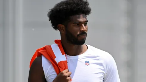 Shedeur Sanders #12 of the Cleveland Browns walks off the field after Cleveland Browns OTA offseason workouts at CrossCountry Mortgage Campus on June 04, 2025 in Berea, Ohio.