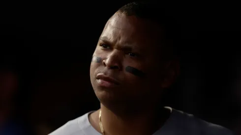 Rafael Devers #11 of the Boston Red Sox looks on from the dugout during the first inning against the New York Yankees at Yankee Stadium on June 08, 2025 in New York City.