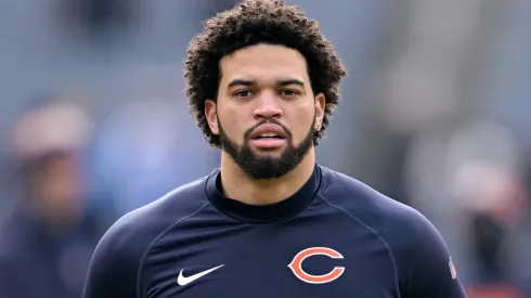 Caleb Williams #18 of the Chicago Bears looks on during warmups before the game against the Detroit Lions at Soldier Field on December 22, 2024 in Chicago, Illinois.