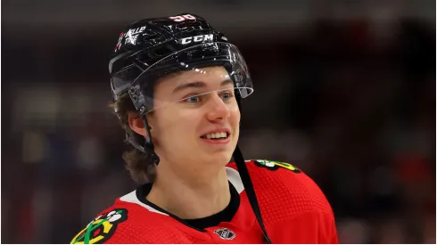 Connor Bedard #98 of the Chicago Blackhawks looks on prior to the game against the St. Louis Blues at the United Center on December 09, 2023 in Chicago, Illinois.