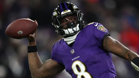 Quarterback Lamar Jackson #8 of the Baltimore Ravens passes the ball against the Houston Texans during the second quarter in the AFC Divisional Playoff game at M&T Bank Stadium on January 20, 2024 in Baltimore, Maryland.