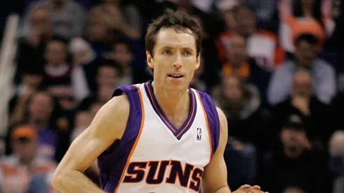 Steve Nash #13 of the Phoenix Suns brings the ball upcourt during the game against the New Orleans Hornets
