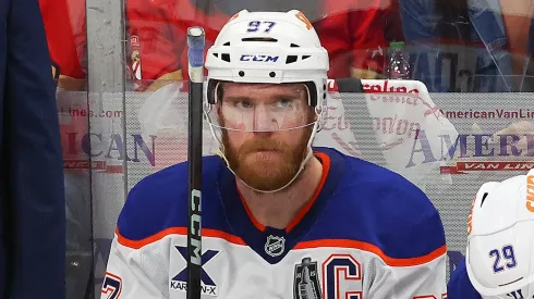 McDavid looks on from the bench during Game 6 of the Stanley Cup Final, reflecting a decade of leadership with the Oilers.