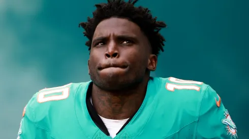 Tyreek Hill #10 of the Miami Dolphins runs onto the field prior to the game against the San Francisco 49ers at Hard Rock Stadium on December 22, 2024 in Miami Gardens, Florida.