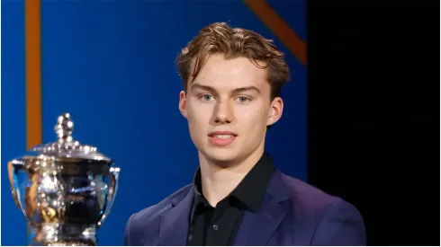 Connor Bedard holds the E. J. McGuire Award of Excellence during the 2023 NHL Awards at Bridgestone Arena on June 26, 2023 in Nashville, Tennessee.