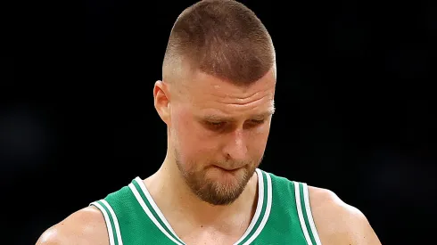Kristaps Porzingis #8 of the Boston Celtics looks on during the game against the Orlando Magic at TD Garden on April 23, 2025 in Boston, Massachusetts.