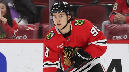 Connor Bedard during a 2025 regular season game with the Chicago Blackhawks, focusing on offseason improvement after declining Team Canada invite.
