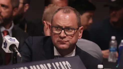 General manager Brad Treliving of the Toronto Maple Leafs works the 2023 Upper Deck NHL Draft.