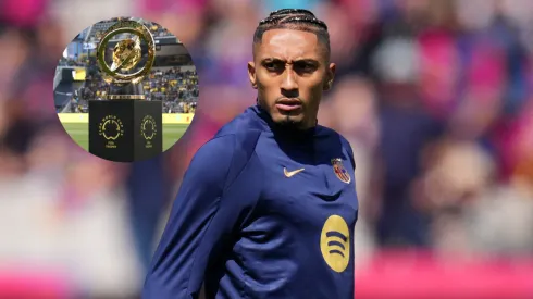 Raphinha of FC Barcelona and FIFA Club World Cup trophy.