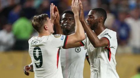 Liam Delap #9 of Chelsea FC celebrates scoring his team's second goal with Tosin Adarabioyo #4 and Benoit Badiashile #5 during the FIFA Club World Cup 2025