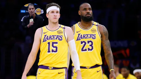 General Manager Rob Pelinka in a corner, and Austin Reaves #15 and LeBron James #23 of the Los Angeles Lakers.
