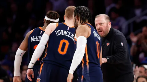 Head coach Tom Thibodeau of the New York Knicks talks with Miles McBride #2, Donte DiVincenzo #0, and Jalen Brunson #11 during the second half against the Sacramento Kings at Madison Square Garden on April 04, 2024 in New York City. The Knicks won 120-109.