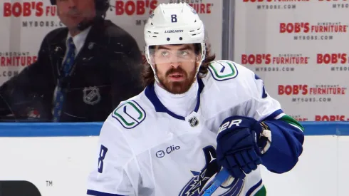 Conor Garland #8 of the Vancouver Canucks skates against the New York Islanders at UBS Arena on March 26, 2025 in Elmont, New York.