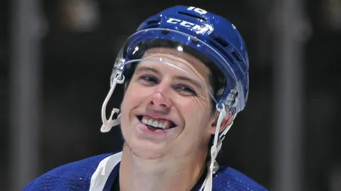 Mitchell Marner #16 of the Toronto Maple Leafs extends his Leafs' team consecutive scoring record to 21 games against the Los Angeles Kings in an NHL game at Scotiabank Arena on December 8, 2022 in Toronto, Ontario, Canada.