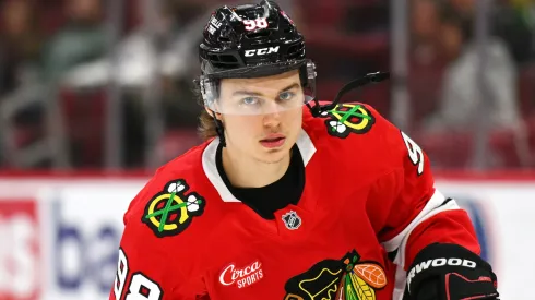 Connor Bedard of the Chicago Blackhawks awaits a faceoff during the 2024–25 regular season. The star center is now eligible to re-sign and begin a new chapter with the franchise.