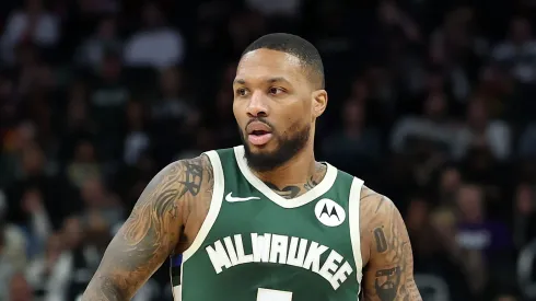 Damian Lillard #0 of the Milwaukee Bucks handles the ball during a game against the Miami Heat