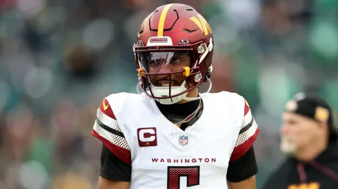 Jayden Daniels #5 of the Washington Commanders looks on prior to the NFC Championship Game against the Philadelphia Eagles at Lincoln Financial Field on January 26, 2025 in Philadelphia, Pennsylvania.