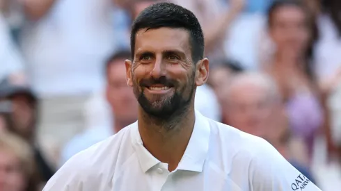 Novak Djokovic of Serbia celebrates his victory against Flavio Cobolli of Italy during Wimbledon quarterfinals.