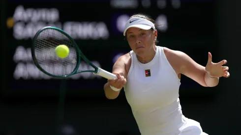 Amanda Anisimova of United States plays a forehand against Aryna Sabalenka during Wimbledon semifinal.