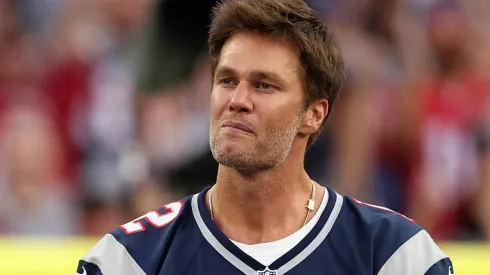 Former New England Patriots quarterback Tom Brady speaks during a ceremony honoring him at halftime of New England's game against the Philadelphia Eagles at Gillette Stadium on September 10, 2023 in Foxborough, Massachusetts.