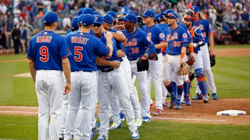 The New York Mets celebrate after defeating the Miami Marlins at Citi Field on September 30, 2018 in the Flushing neighborhood of the Queens borough of New York City. The Mets won 1-0.
