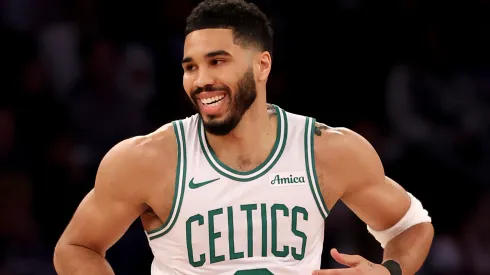 Jayson Tatum #0 of the Boston Celtics celebrates his three point shot in the first half against the New York Knicks.