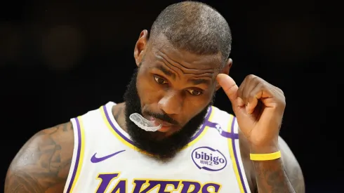 LeBron James #23 of the Los Angeles Lakers reacts during the first half of the Emirates NBA Cup game against the Phoenix Suns at Footprint Center on November 26, 2024 in Phoenix, Arizona.