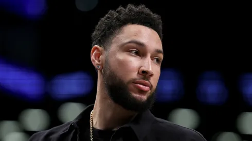 Ben Simmons #10 of the Brooklyn Nets looks on from the bench in the first half against the Orlando Magic.