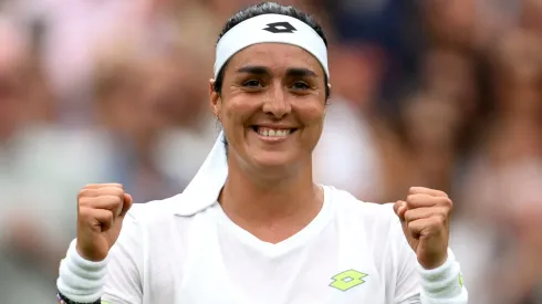 Ons Jabeur of Tunisia celebrates victory against Aryna Sabalenka following the Women's Singles Semi Finals on day eleven of The Championships Wimbledon 2023.