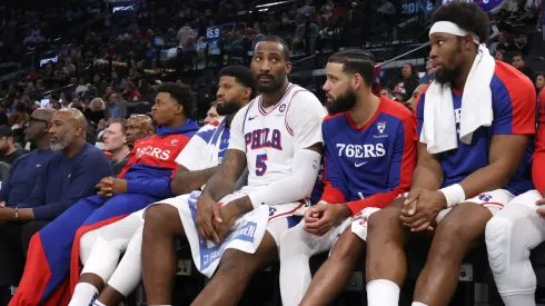 Guerschon Yabusele #28, Caleb Martin #16, Andre Drummond #5, Paul George #8 and Kyle Lowry #7 of the Philadelphia 76ers watch play from the bench during a 110-98 LA Clippers win.