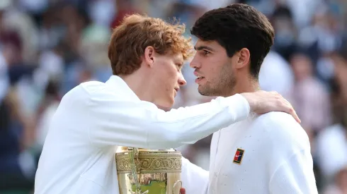 Jannik Sinner embraces Carlos Alcaraz after the final of Wimbledon 2025