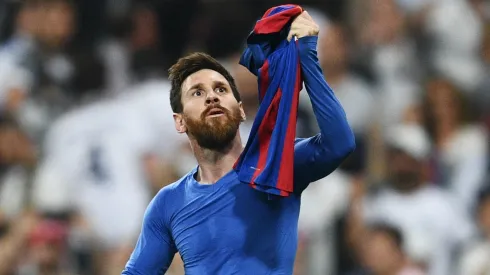 Lionel Messi celebrates as he scores their third goal during the La Liga match between Real Madrid CF and FC Barcelona in 2017
