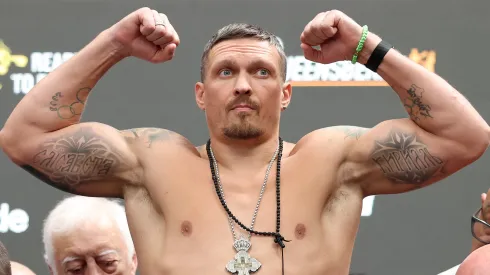 Oleksandr Usyk poses for a photograph as he weighs in during the 'Undisputed' weigh in at BOXPARK Wembley on July 18, 2025.