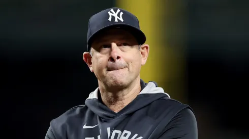 Manager Aaron Boone #17 reacts after Oswaldo Cabrera #95 of the New York Yankees injured himself on a play against the Seattle Mariners during the ninth inning at T-Mobile Park on May 12, 2025 in Seattle, Washington.