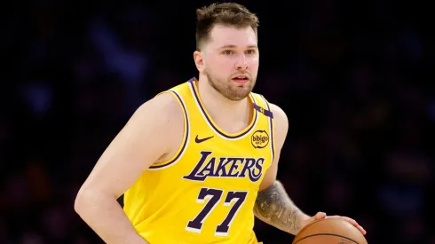 Luka Doncic #77 of the Los Angeles Lakers dribbles during a 103-96 loss to the Minnesota Timberwolves.