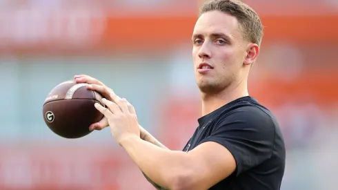 Carson Beck #15 of the Georgia Bulldogs warms-up prior to a game against the Texas Longhorns at Darrell K Royal-Texas Memorial Stadium on October 19, 2024 in Austin, Texas.