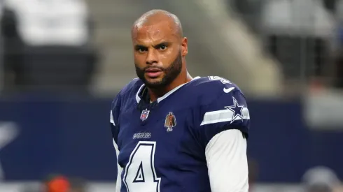 Dak Prescott #4 of the Dallas Cowboys looks on while warming up before a game against the Detroit Lions at AT&T Stadium on October 13, 2024 in Arlington, Texas.