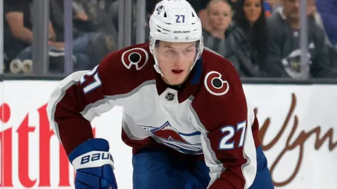 Oskar Olausson #27 with the Colorado Avalanche skates with the puck against the Vegas Golden Knights in the first period of their preseason game at T-Mobile Arena on September 28, 2021 in Las Vegas, Nevada.