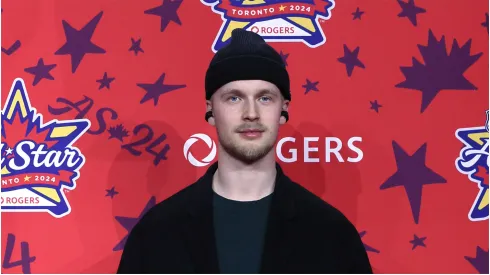 Elias Pettersson #40 of the Vancouver Canucks poses for a photo on the red carpet during 2024 NHL All-Star Thursday at Scotiabank Arena on February 01, 2024 in Toronto, Ontario, Canada.