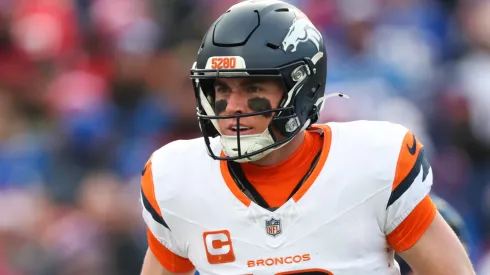 Bo Nix #10 of the Denver Broncos celebrates after a touchdown against the Buffalo Bills during the first quarter during the AFC Wild Card Playoffs at Highmark Stadium on January 12, 2025 in Orchard Park, New York.