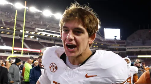 Arch Manning #16 of the Texas Longhorns reacts after defeating the Texas A&M Aggies 17-7 at Kyle Field on November 30, 2024 in College Station, Texas.